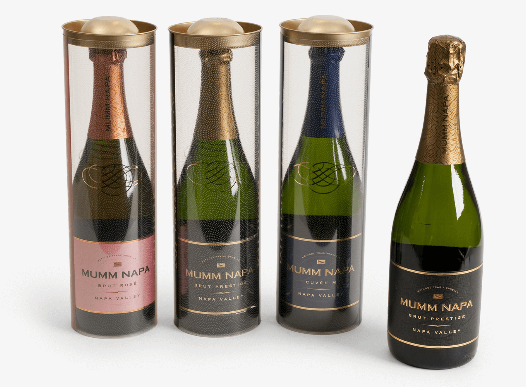 Three bottles of champagne on a white background.