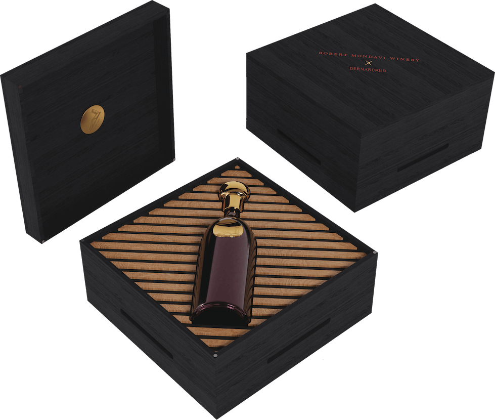 A bottle of champagne in a wooden box.